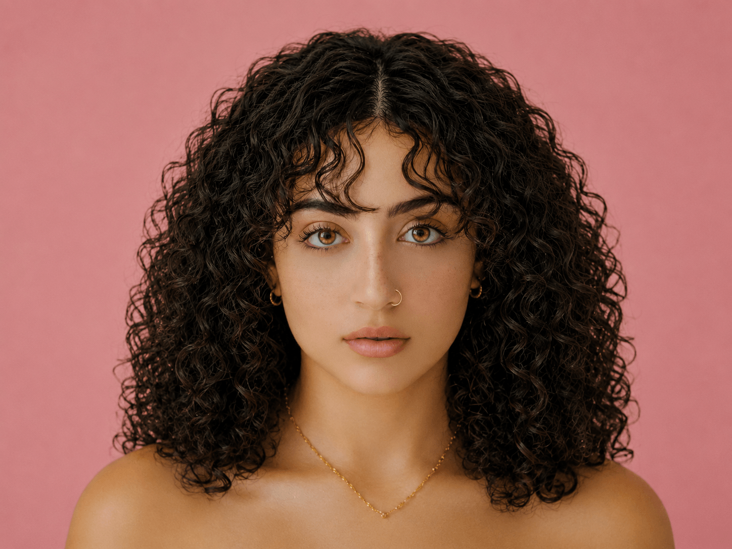 A woman wearing a sleek black lace front wig — La Nuit Collection